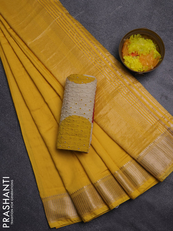 Semi chanderi saree yellow and beige with plain body and zari woven border