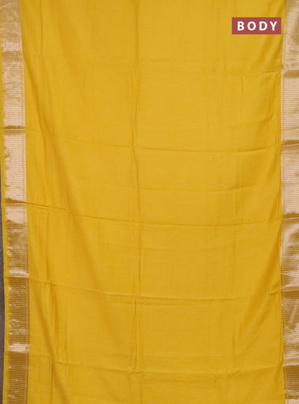 Semi chanderi saree yellow and beige with plain body and zari woven border