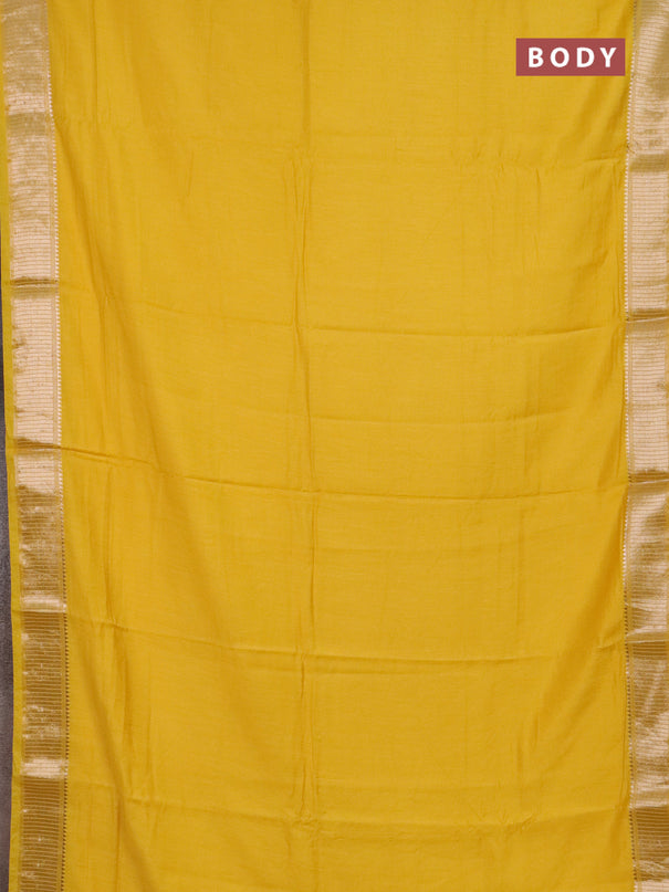 Semi chanderi saree yellow and beige with plain body and zari woven border