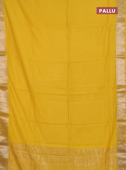 Semi chanderi saree yellow and beige with plain body and zari woven border