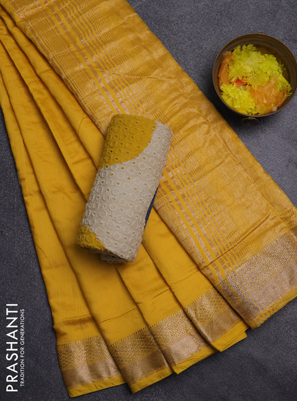 Semi chanderi saree yellow and beige blue with plain body and zari woven border