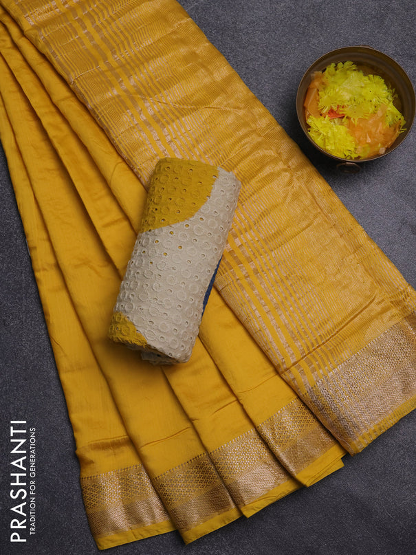 Semi chanderi saree yellow and beige blue with plain body and zari woven border