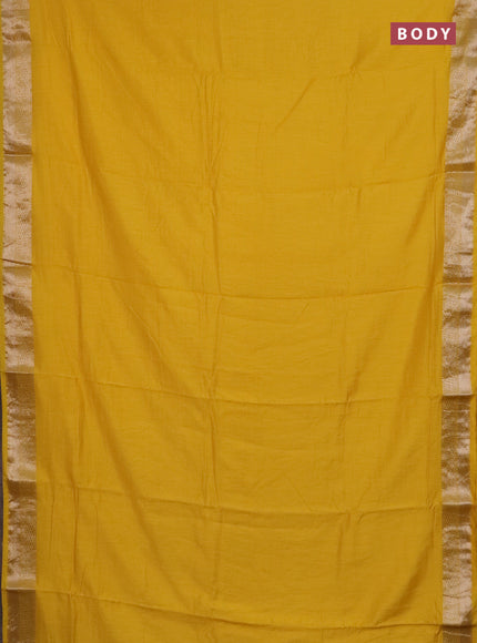 Semi chanderi saree yellow and beige blue with plain body and zari woven border