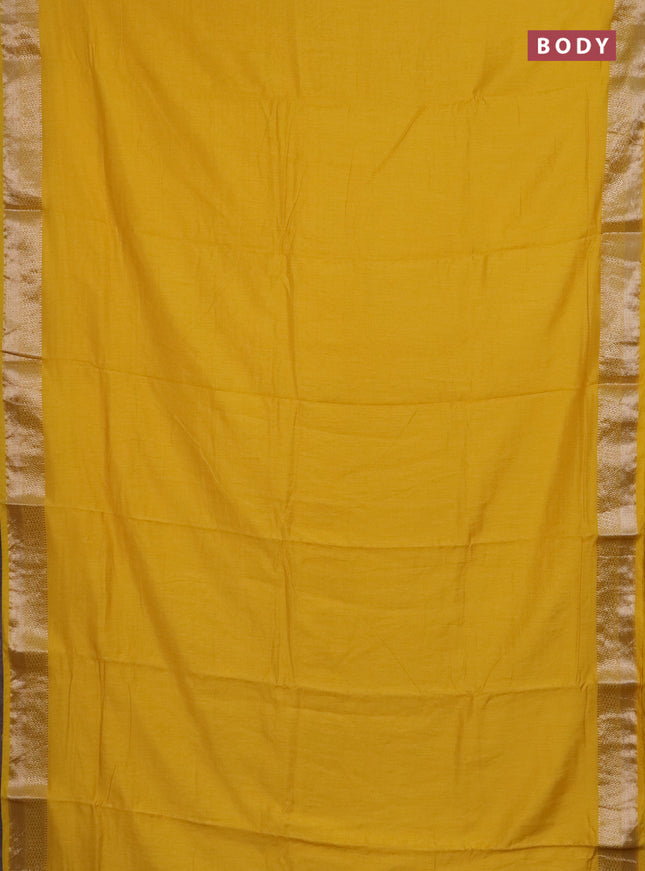 Semi chanderi saree yellow and beige blue with plain body and zari woven border