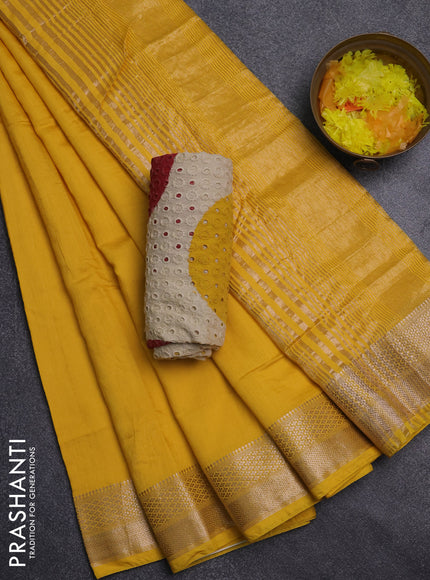 Semi chanderi saree yellow and beige green with plain body and zari woven border