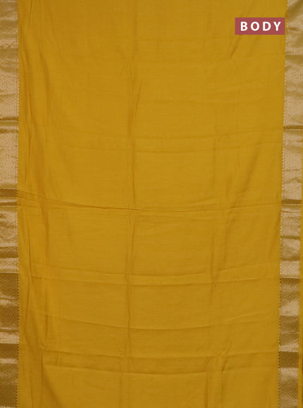 Semi chanderi saree yellow and beige with plain body and zari woven border
