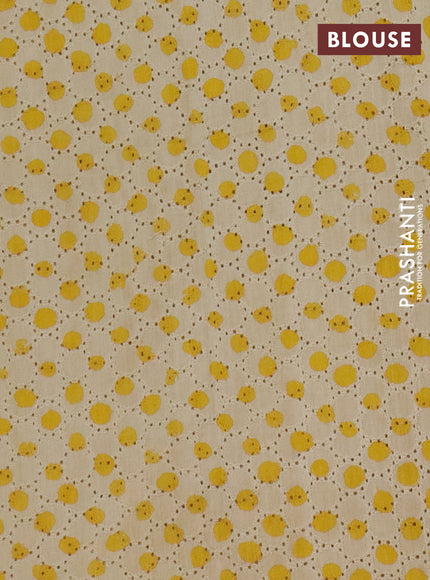 Semi chanderi saree yellow and beige with plain body and zari woven border