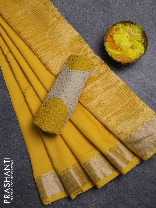 Semi chanderi saree yellow and beige with plain body and zari woven border