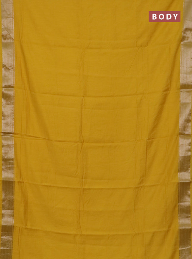 Semi chanderi saree yellow and beige with plain body and zari woven border