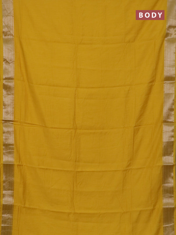 Semi chanderi saree yellow and beige with plain body and zari woven border