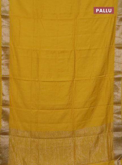 Semi chanderi saree yellow and beige with plain body and zari woven border
