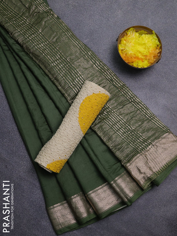 Semi chanderi saree sap green and beige with plain body and zari woven border