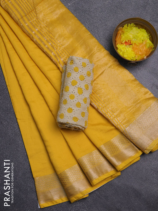 Semi chanderi saree yellow and beige with plain body and zari woven border