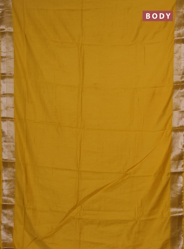 Semi chanderi saree yellow and beige with plain body and zari woven border