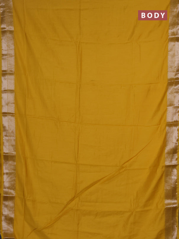 Semi chanderi saree yellow and beige with plain body and zari woven border