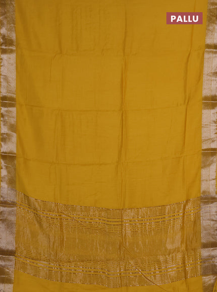 Semi chanderi saree yellow and beige with plain body and zari woven border