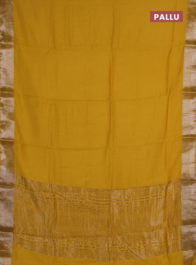Semi chanderi saree yellow and beige with plain body and zari woven border