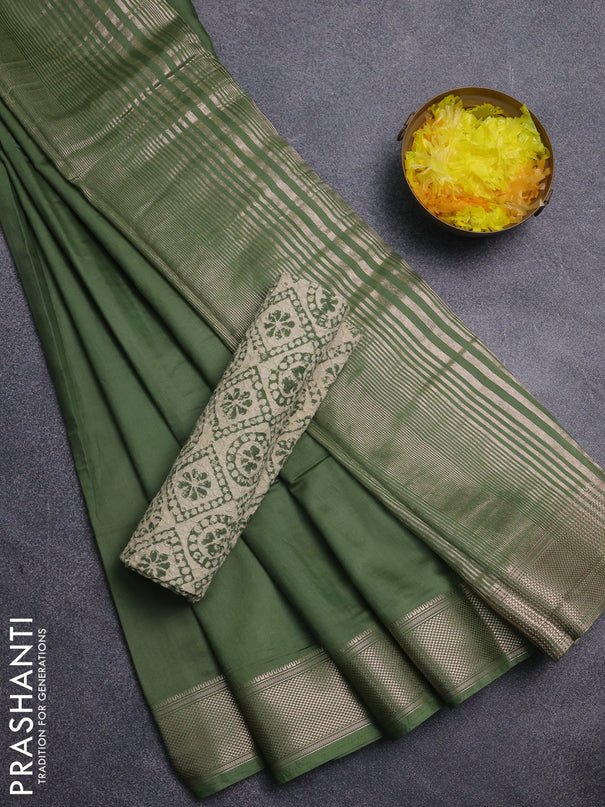 Semi chanderi saree sap green and beige with plain body and zari woven border
