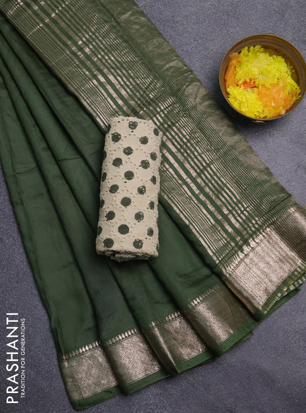 Semi chanderi saree green and beige with plain body and zari woven border