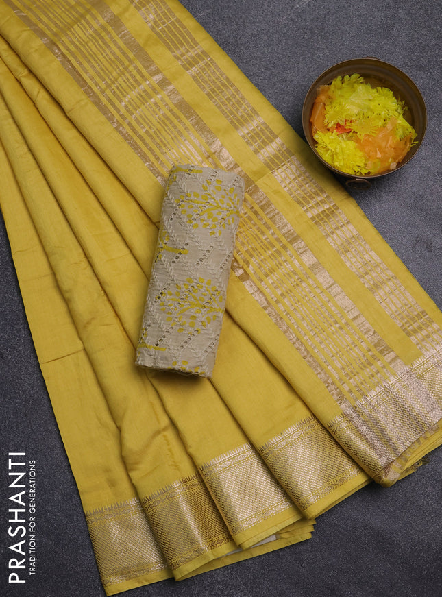 Semi chanderi saree yellow and beige with plain body and zari woven border