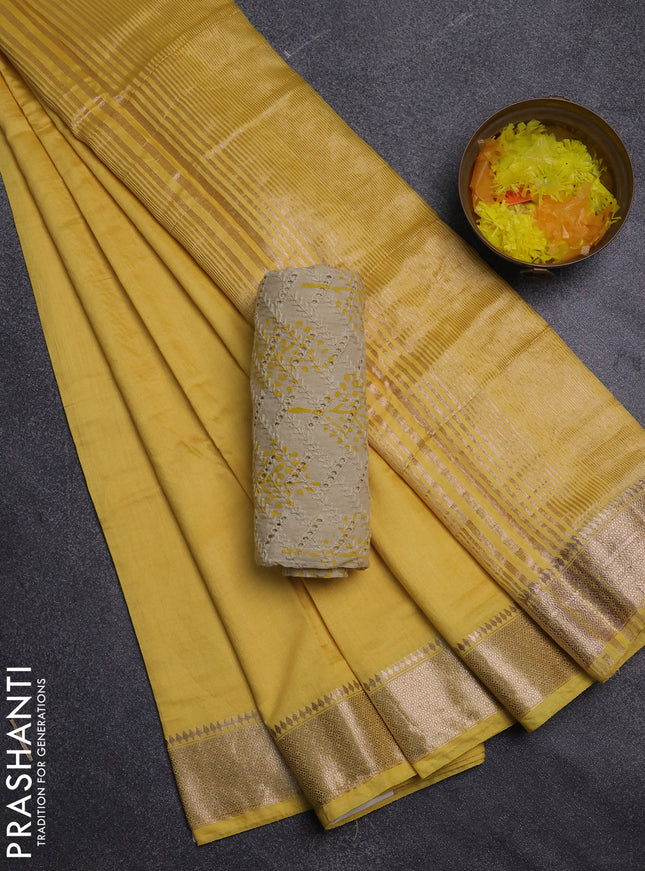 Semi chanderi saree yellow and beige with plain body and zari woven border
