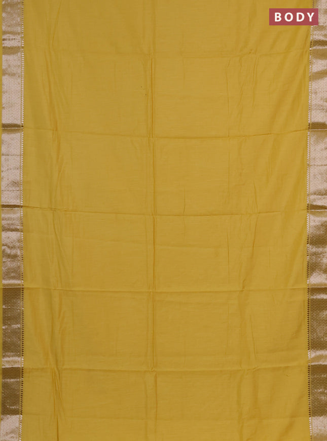 Semi chanderi saree yellow and beige with plain body and zari woven border