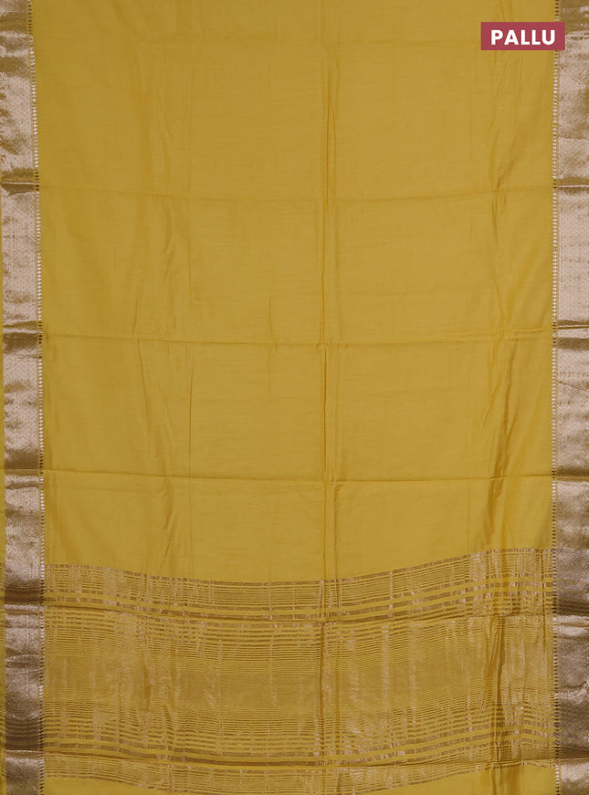 Semi chanderi saree yellow and beige with plain body and zari woven border