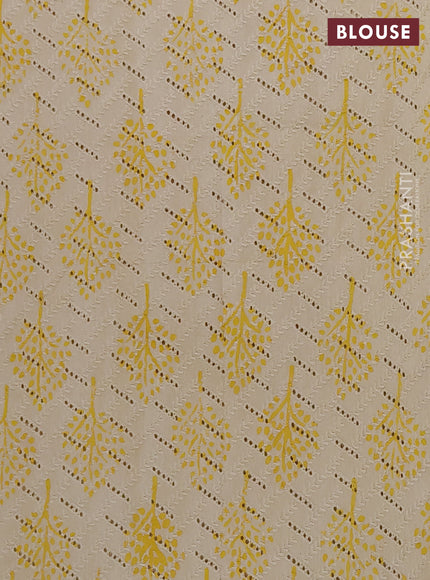Semi chanderi saree yellow and beige with plain body and zari woven border