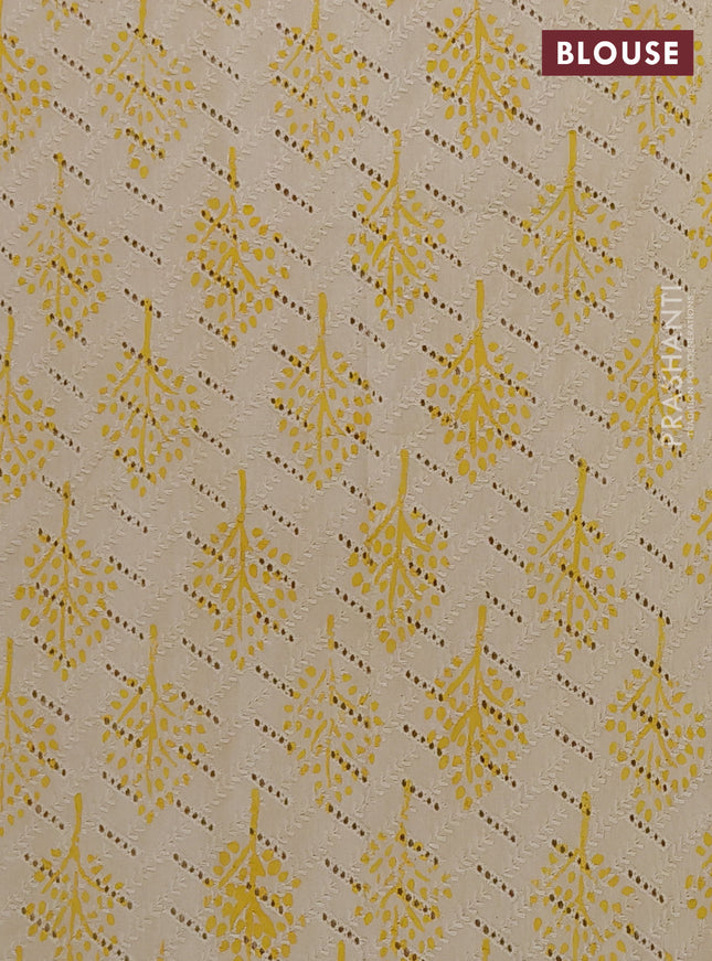 Semi chanderi saree yellow and beige with plain body and zari woven border