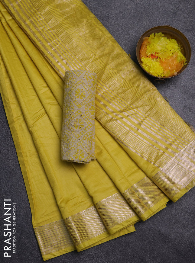 Semi chanderi saree yellow and beige with plain body and zari woven border
