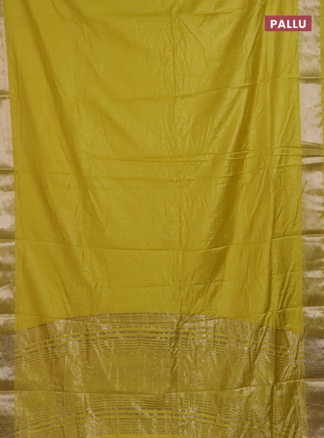 Semi chanderi saree yellow and beige with plain body and zari woven border