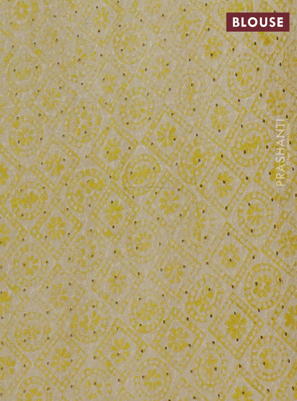 Semi chanderi saree yellow and beige with plain body and zari woven border