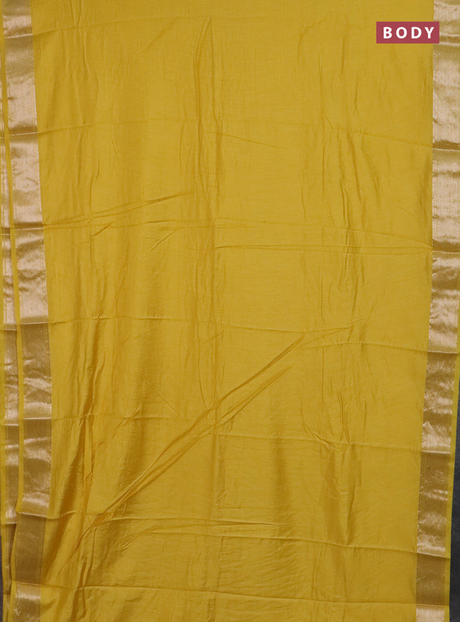 Semi chanderi saree yellow and beige with plain body and zari woven border