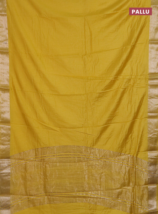 Semi chanderi saree yellow and beige with plain body and zari woven border