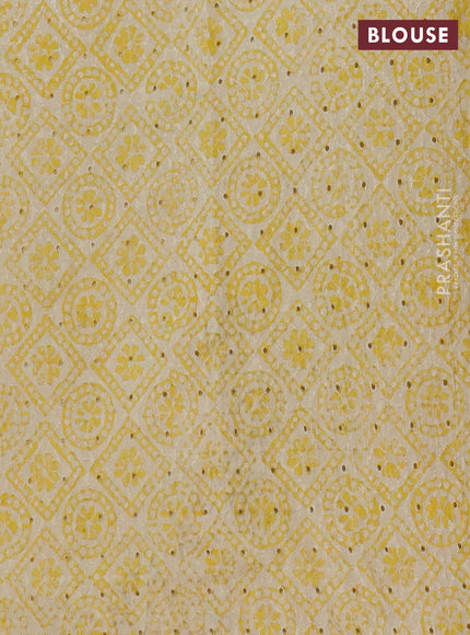 Semi chanderi saree yellow and beige with plain body and zari woven border