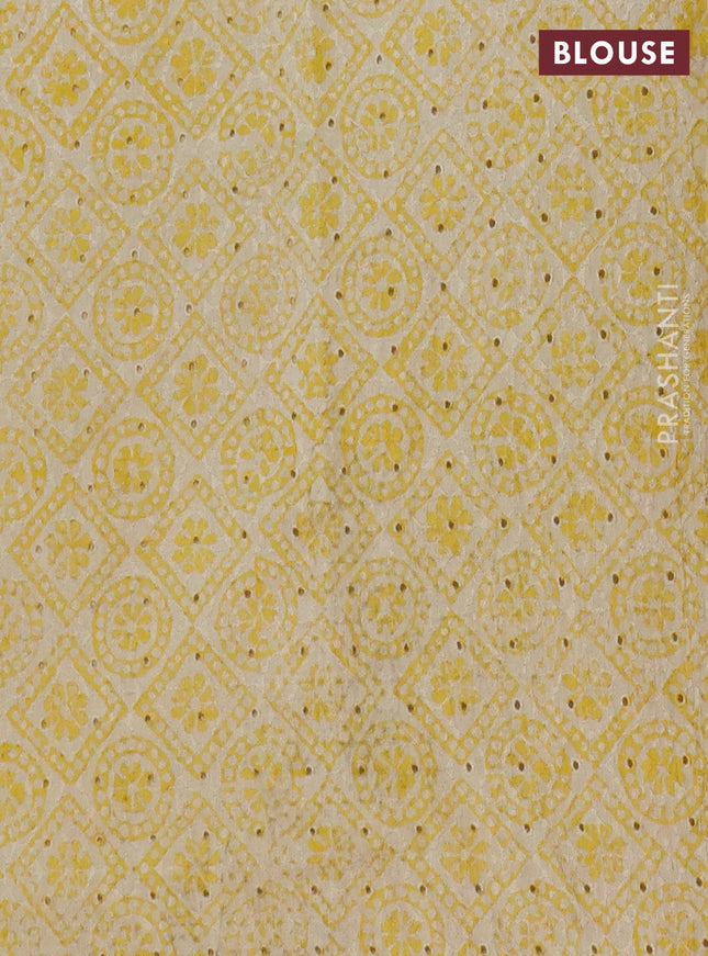 Semi chanderi saree yellow and beige with plain body and zari woven border