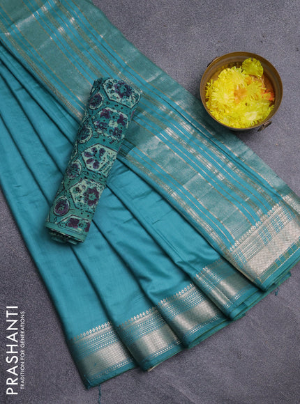 Semi chanderi saree teal green and beige with plain body and zari woven border