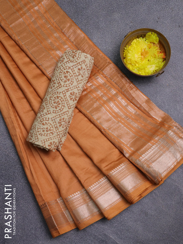 Semi chanderi saree dark sandal and beige with plain body and zari woven border
