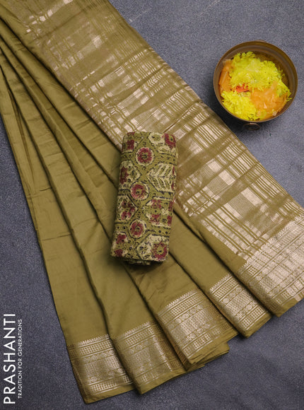 Semi chanderi saree mehendi green and beige with plain body and zari woven border