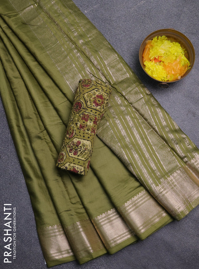 Semi chanderi saree mehendi green and light green with plain body and zari woven border