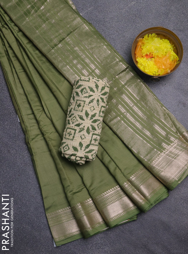 Semi chanderi saree light green with plain body and zari woven border