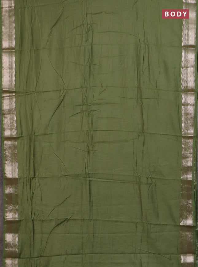 Semi chanderi saree light green with plain body and zari woven border