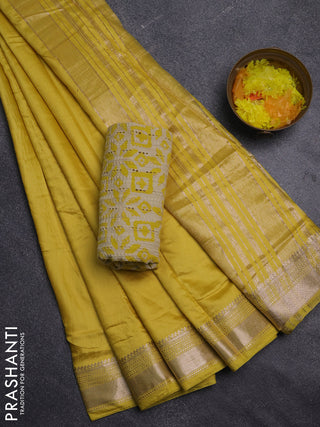 Semi chanderi saree yellow with plain body and zari woven border