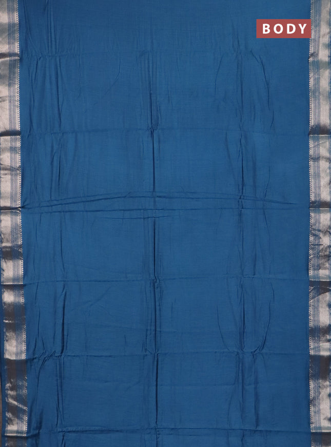 Semi chanderi saree peacock blue with plain body and zari woven border