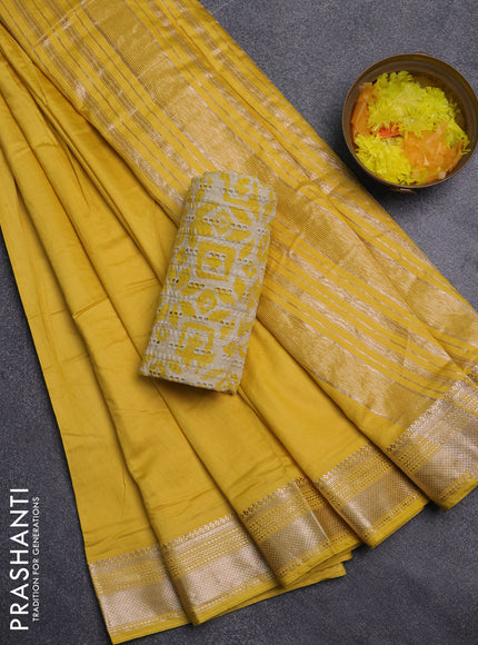 Semi chanderi saree yellow with plain body and zari woven border