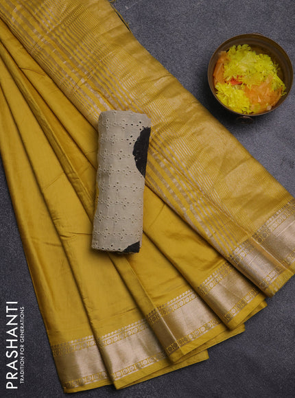 Semi chanderi saree yellow and beige with plain body and zari woven border