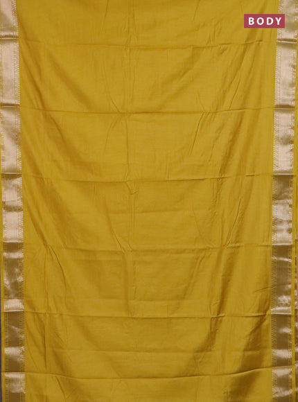 Semi chanderi saree yellow and beige with plain body and zari woven border