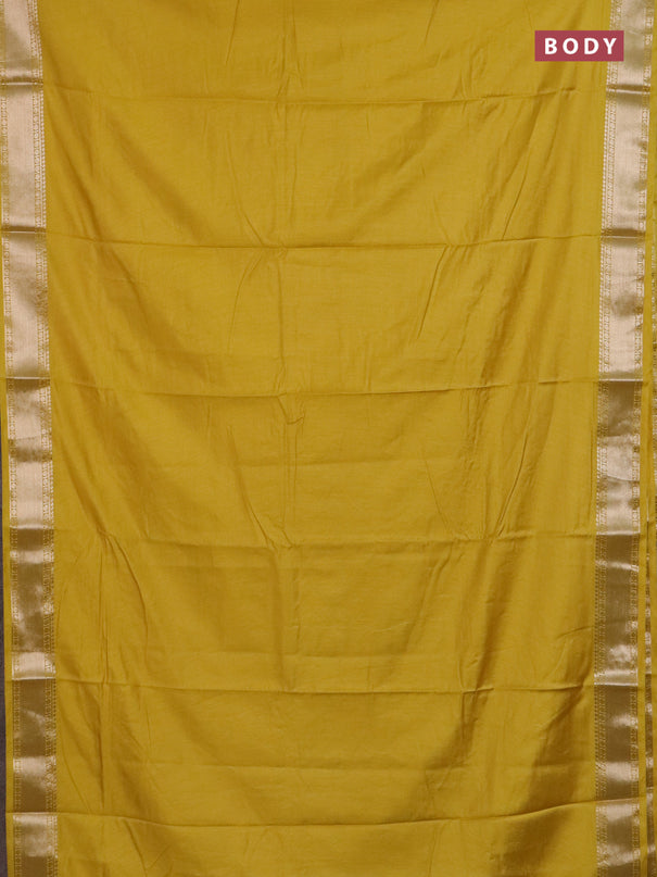 Semi chanderi saree yellow and beige with plain body and zari woven border