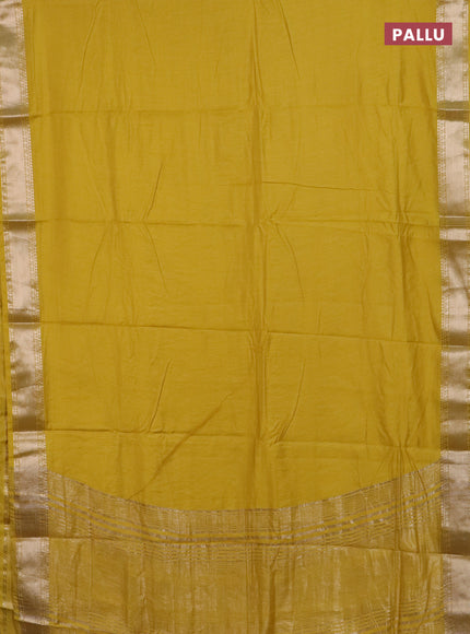 Semi chanderi saree yellow and beige with plain body and zari woven border