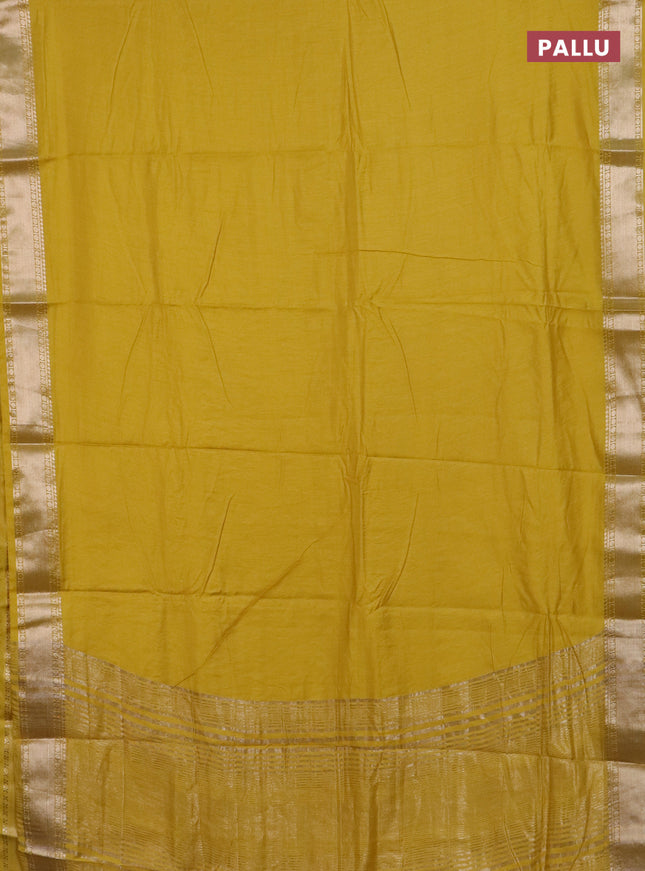 Semi chanderi saree yellow and beige with plain body and zari woven border